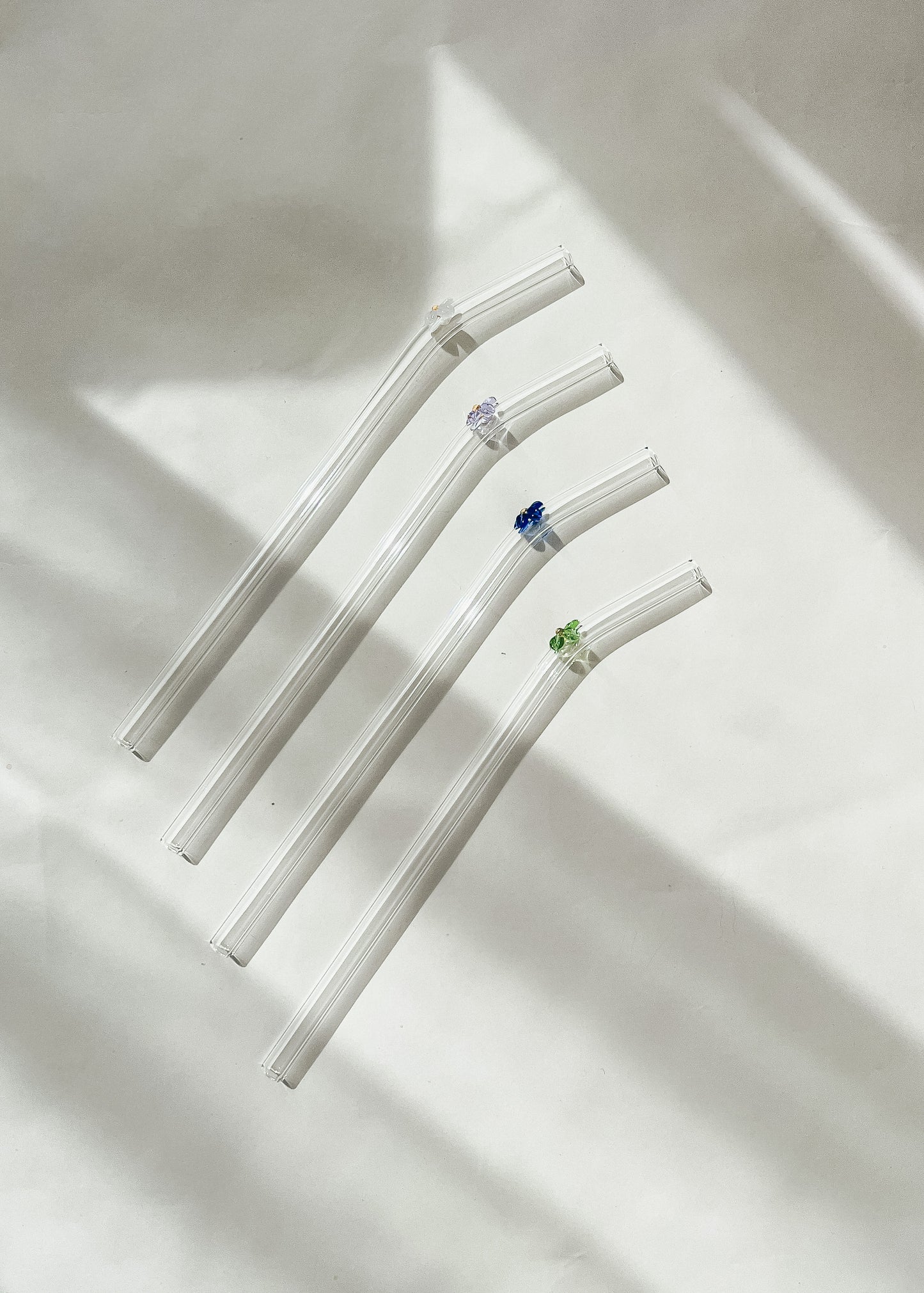 Glass drinking straw with flower